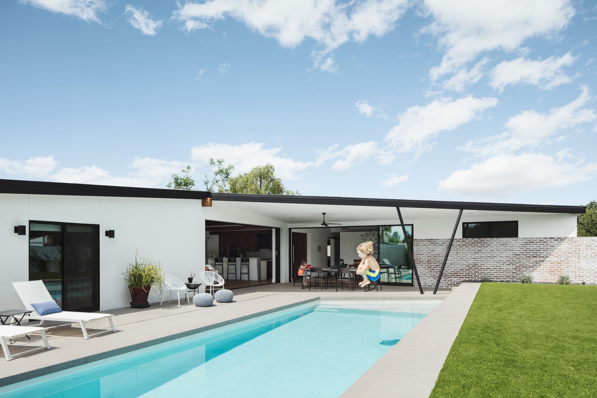 Rear elevation and pool of the Arcadia residence after its full remodel